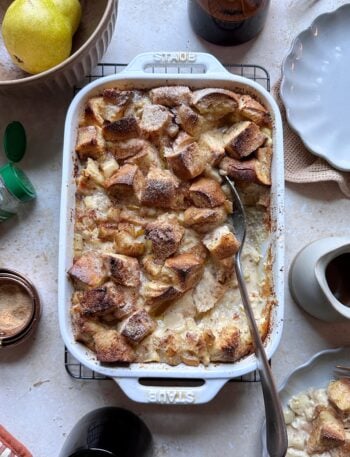 challah baked pear french toast with serving spoon