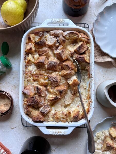 challah baked pear french toast with serving spoon