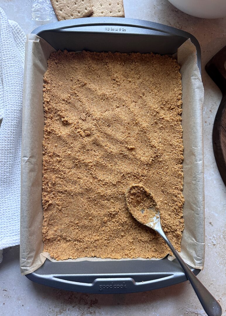 graham cracker crust pressed into baking pan