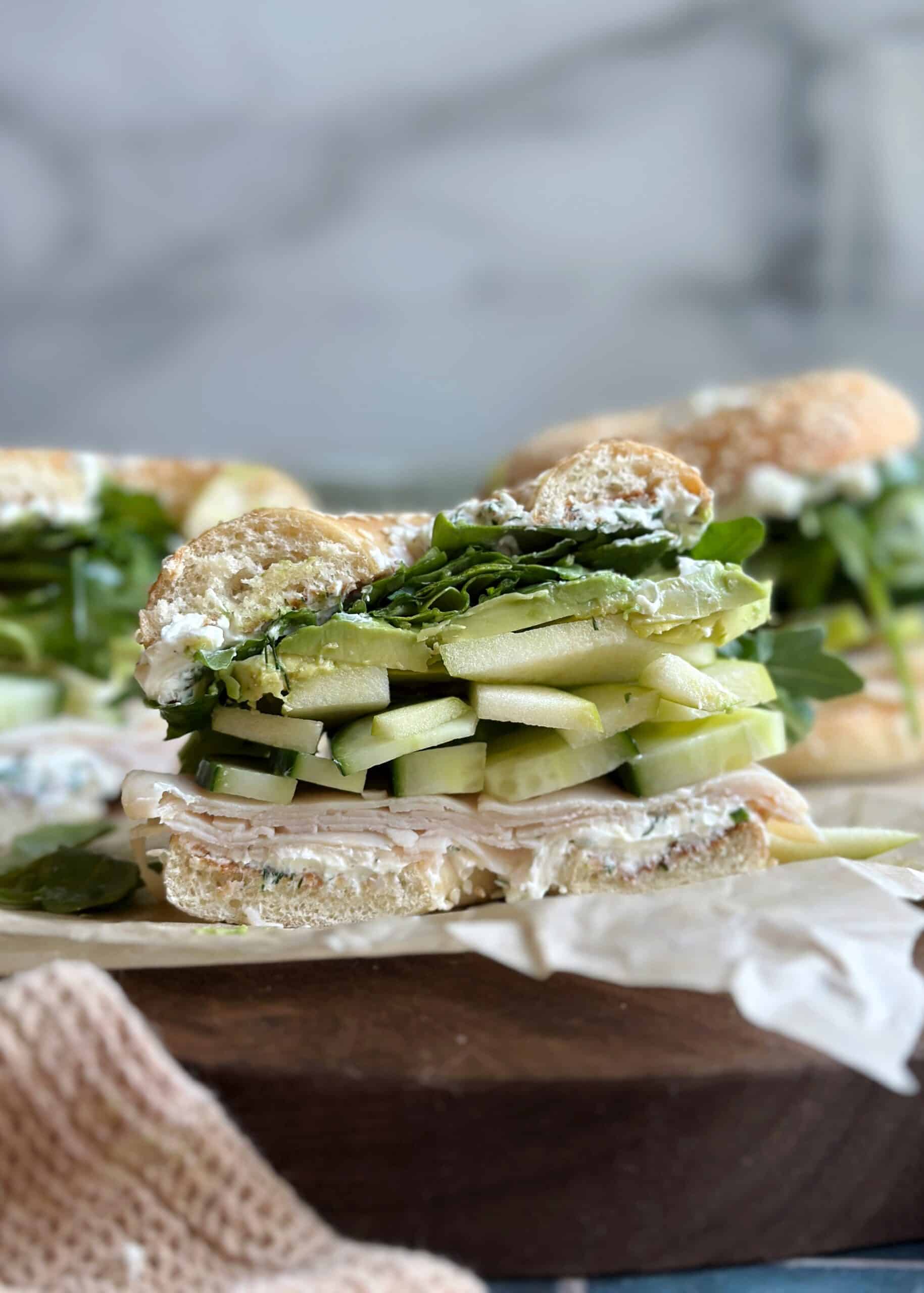 mean green vegetable bagel sandwiches