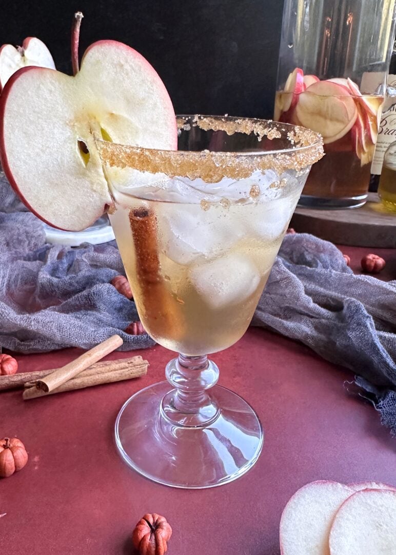 orange wine sangria with apple and cinnamon garnish