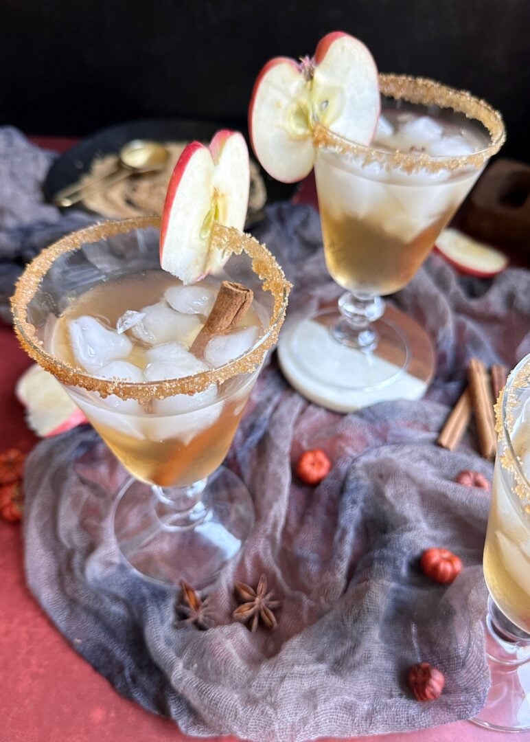 poison apple halloween sangria with apple garnish