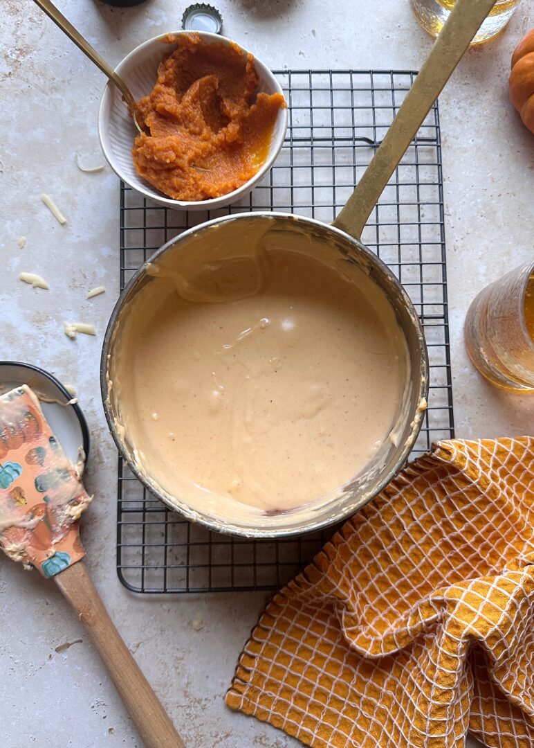 pumpkin beer cheese in copper saucepan