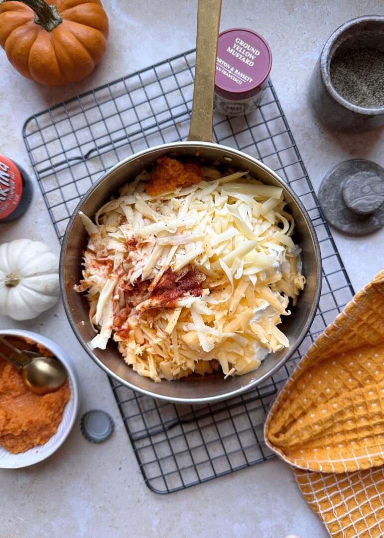 pumpkin beer cheese ingredients in copper saucepan