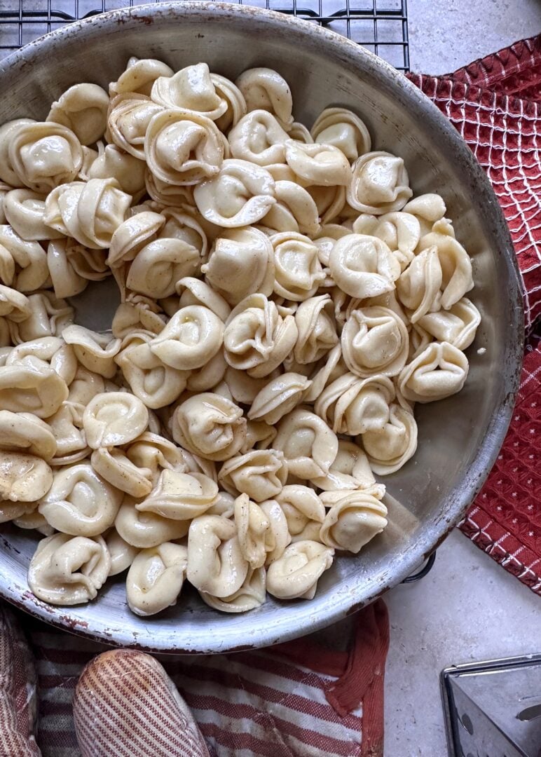 tortellini in a skillet with brown butter