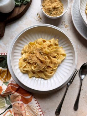 plate of brown butter pumpkin alfredo with sage breadcrumbs