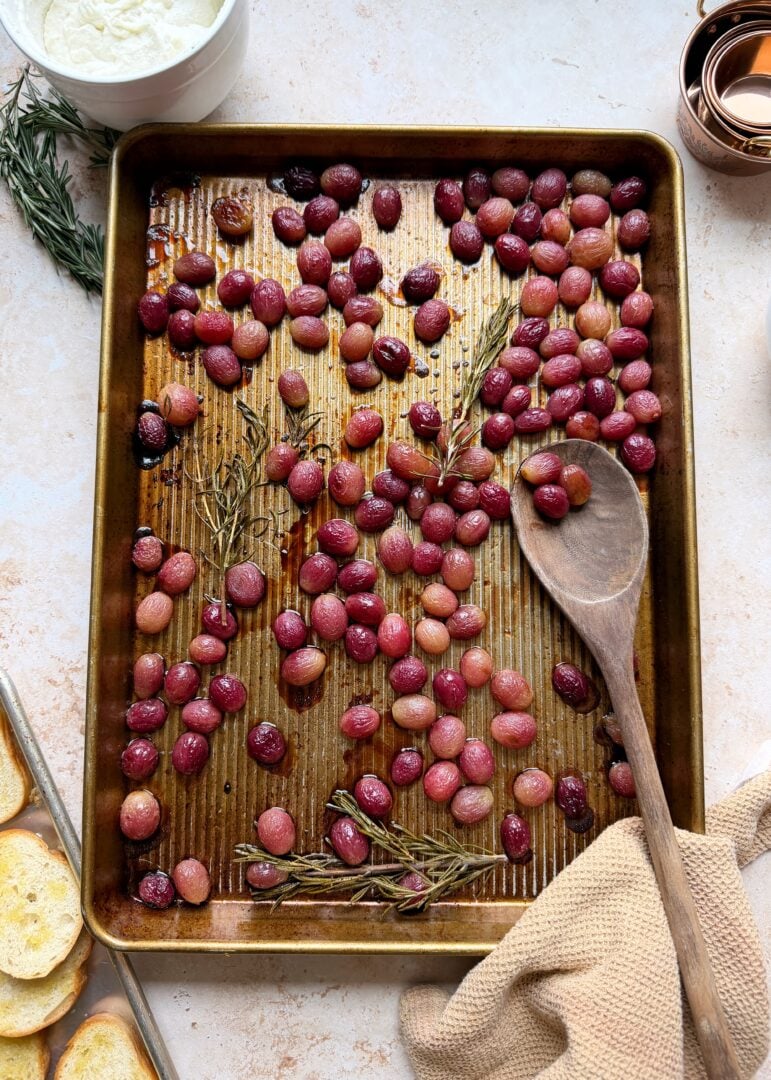 roasted grapes on baking sheet