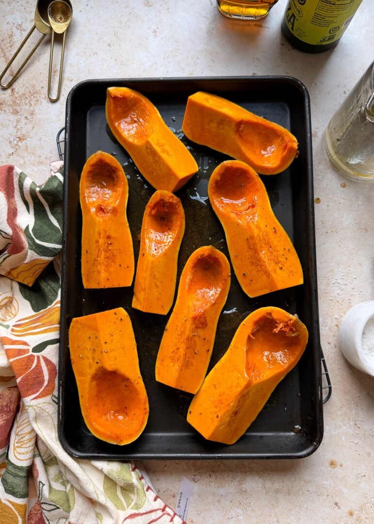 sheet pan with seasoned butternut squash