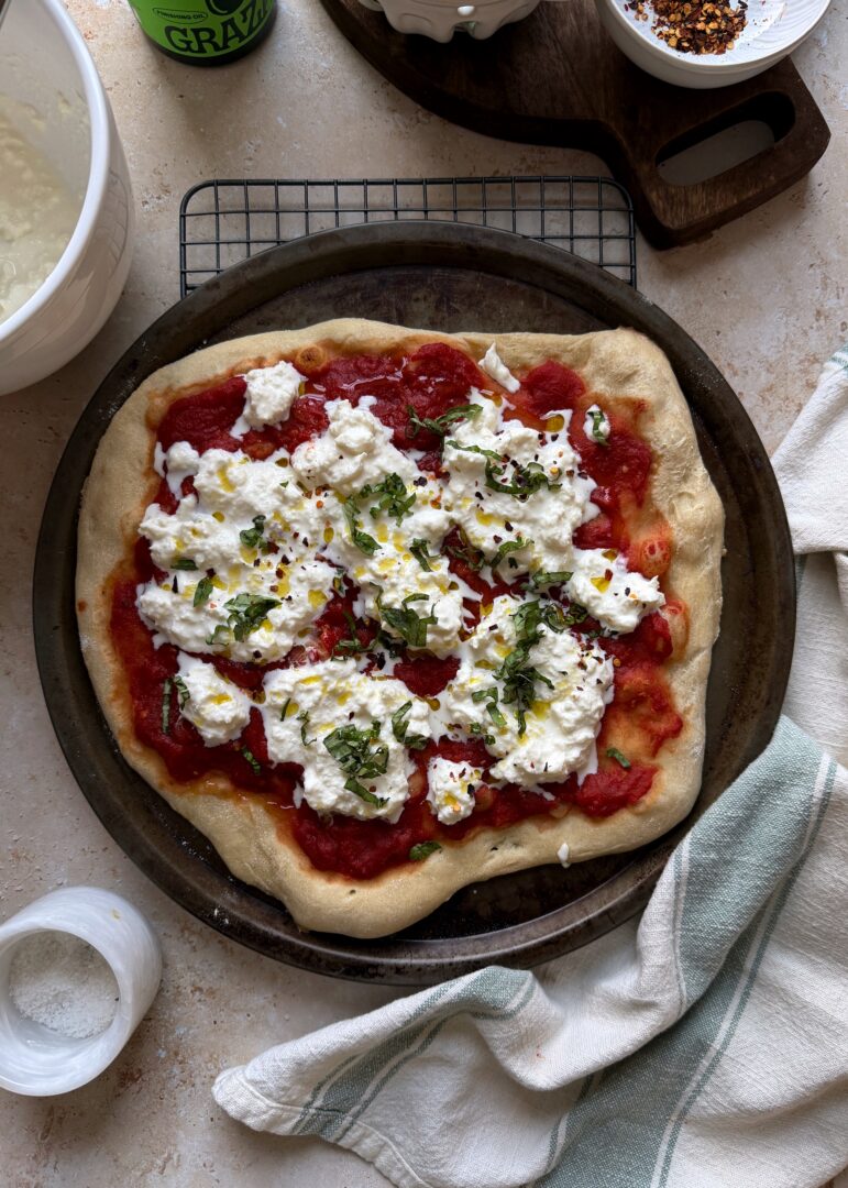 stracciatella pizza with fresh basil