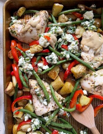 mediterranean sheet pan chicken with feta salad and tahini sauce