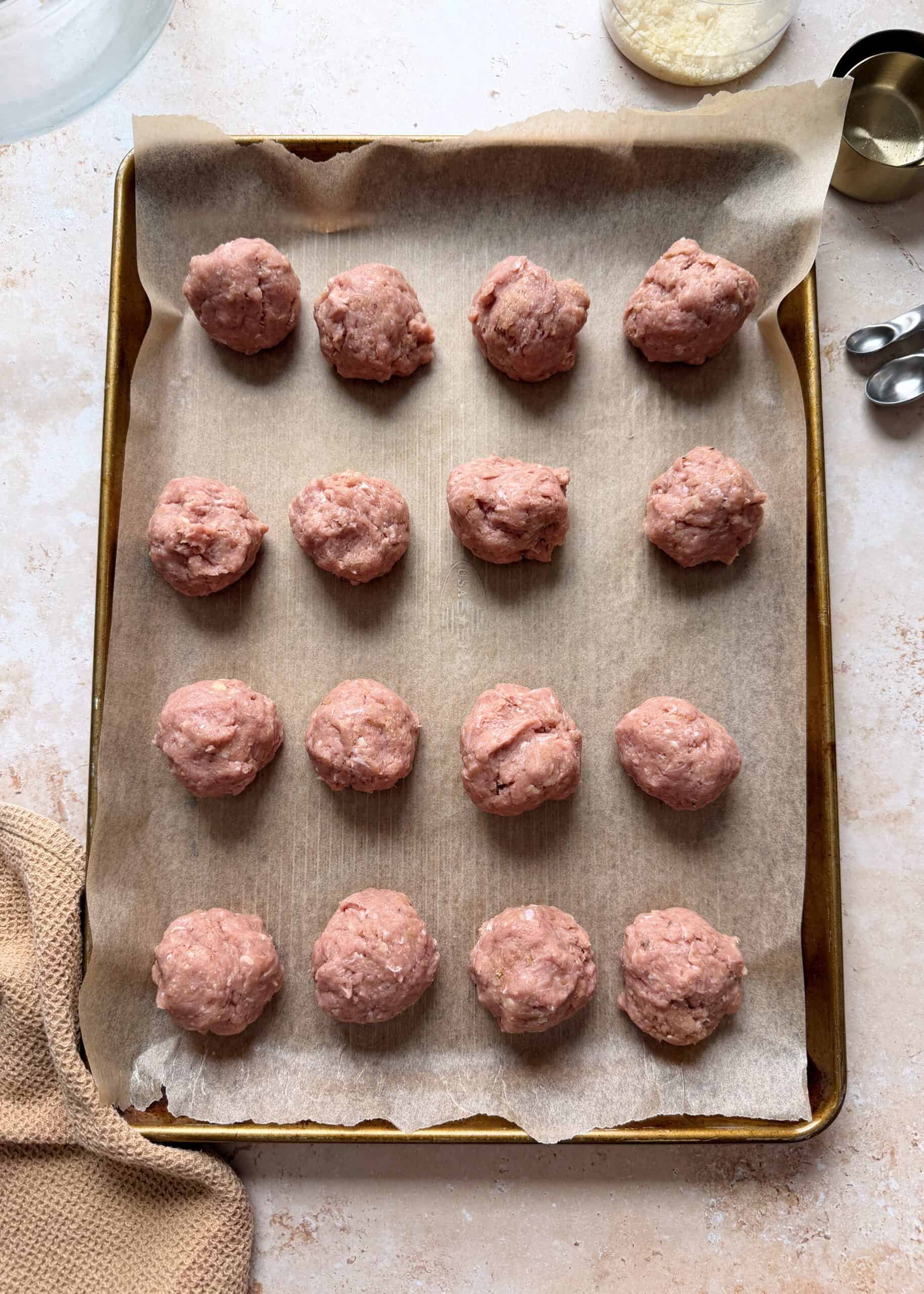 turkey meatballs on a sheet pan before baking