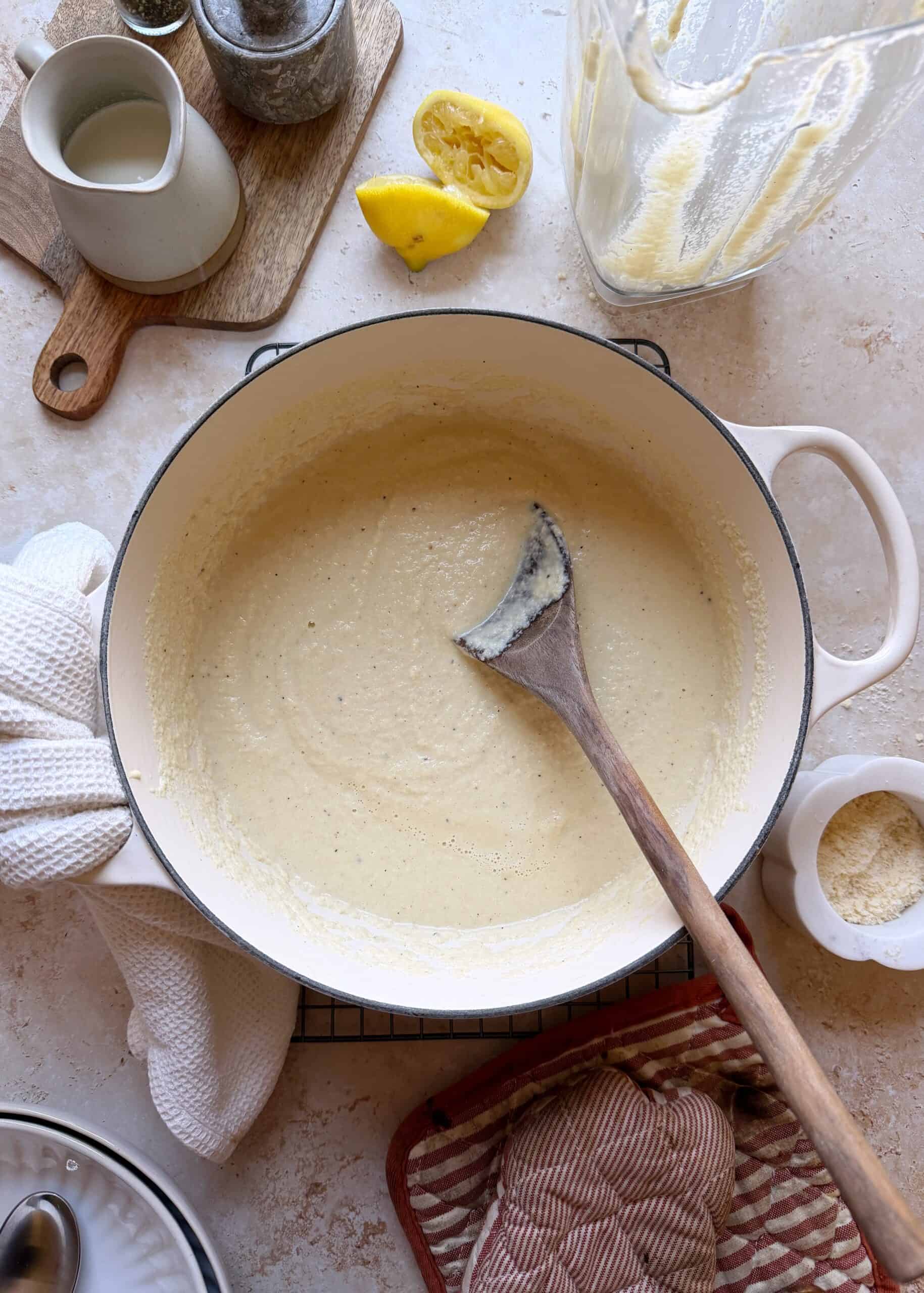 roasted cauliflower and artichoke soup in white dutch oven
