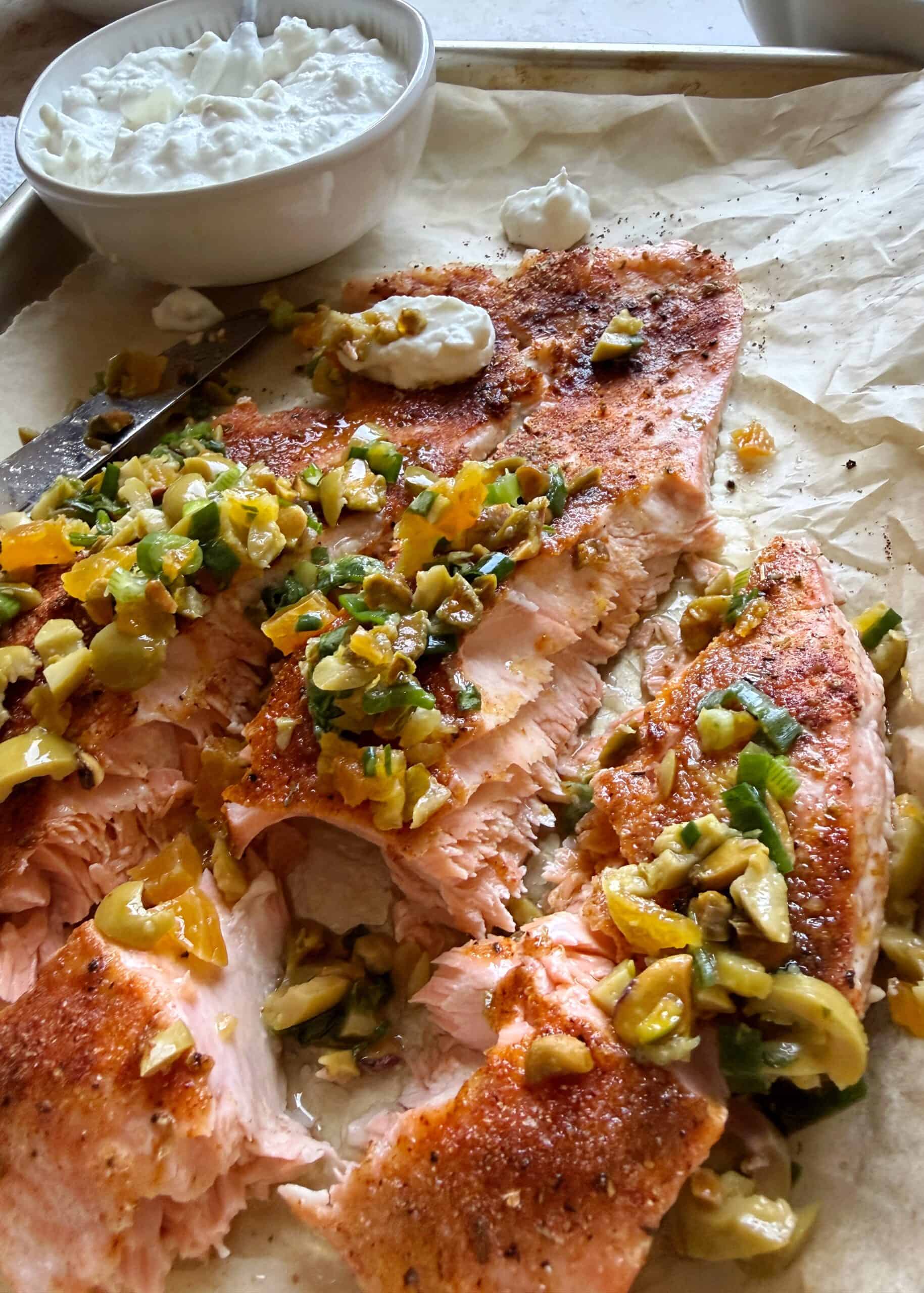 roasted filet of salmon with olive and apricot salad