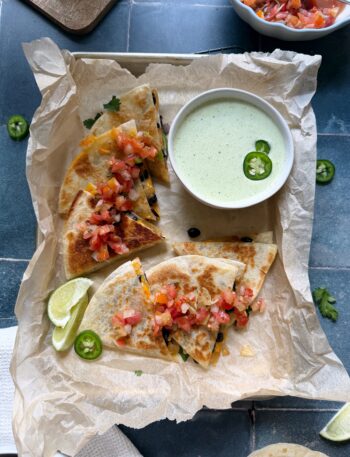 cheesy black bean quesadillas with jalapeno cilantro sauce on the side